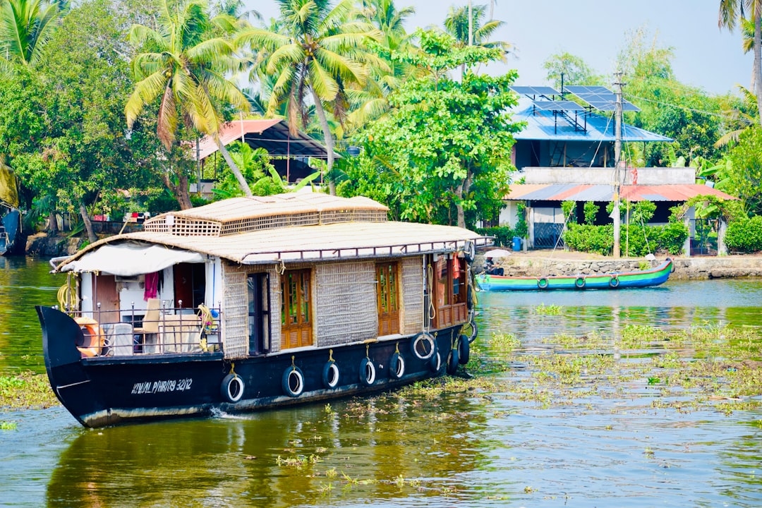 Kerala backwaters with traditional houseboat - Scenic tropical destination